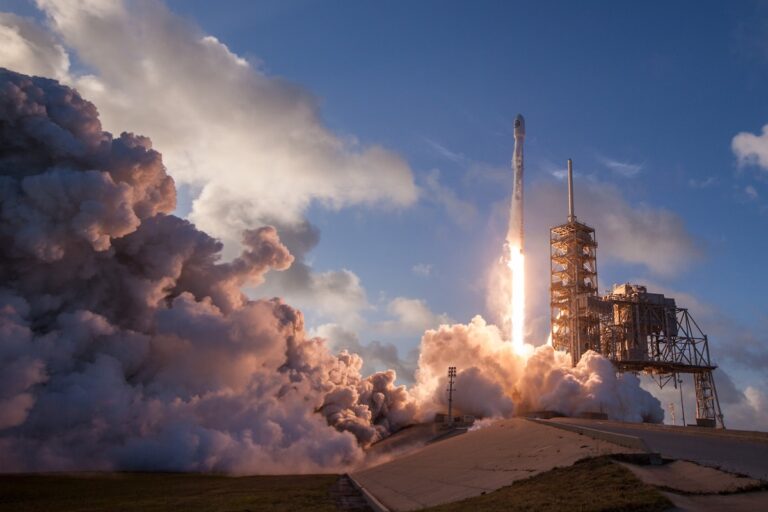 NASA Space Launch System rocket on launch pad preparing for lunar mission